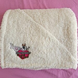 A white towel with a harley davidson logo on it.